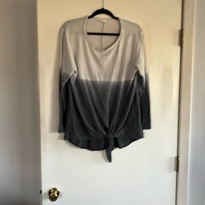 Large light sweater like top